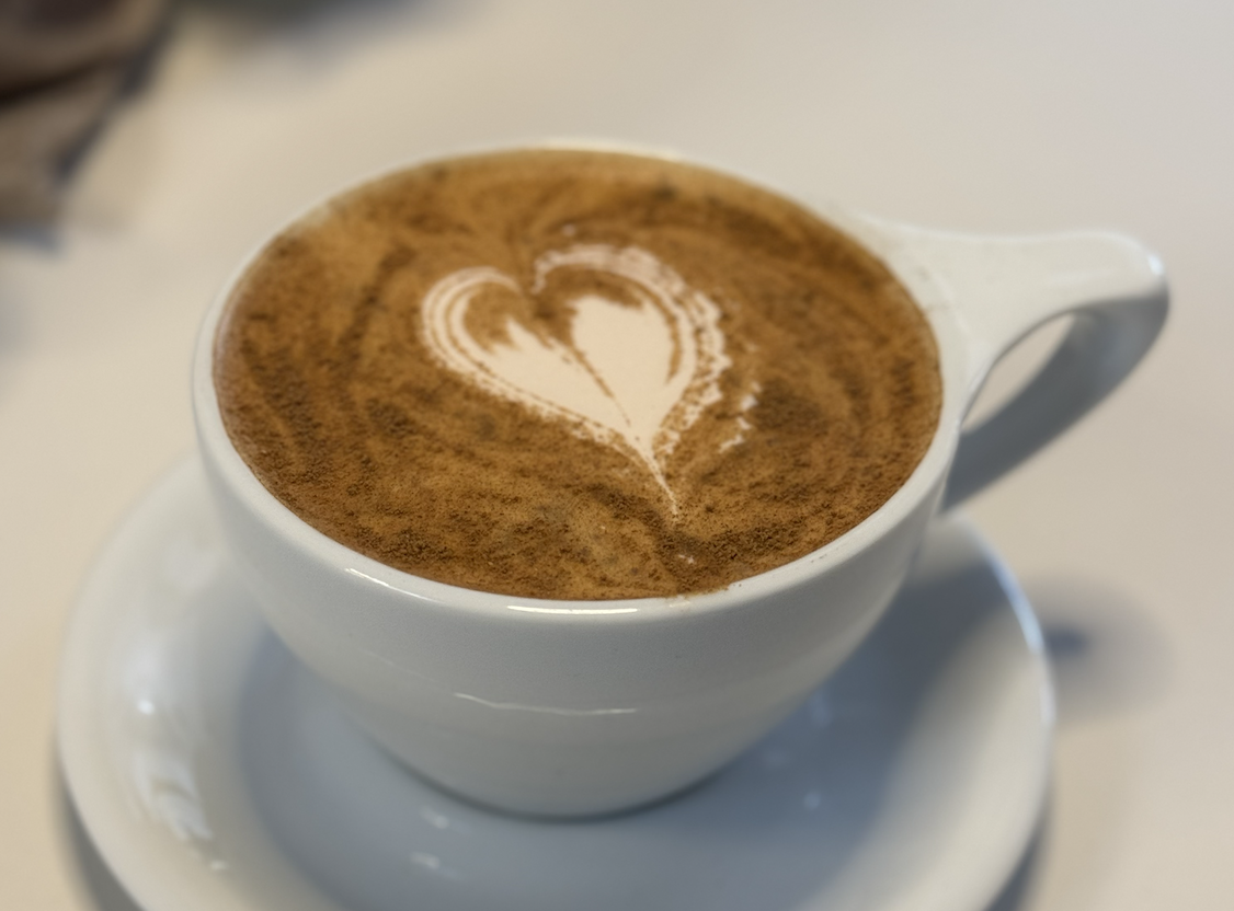 heart design froth on a coffee